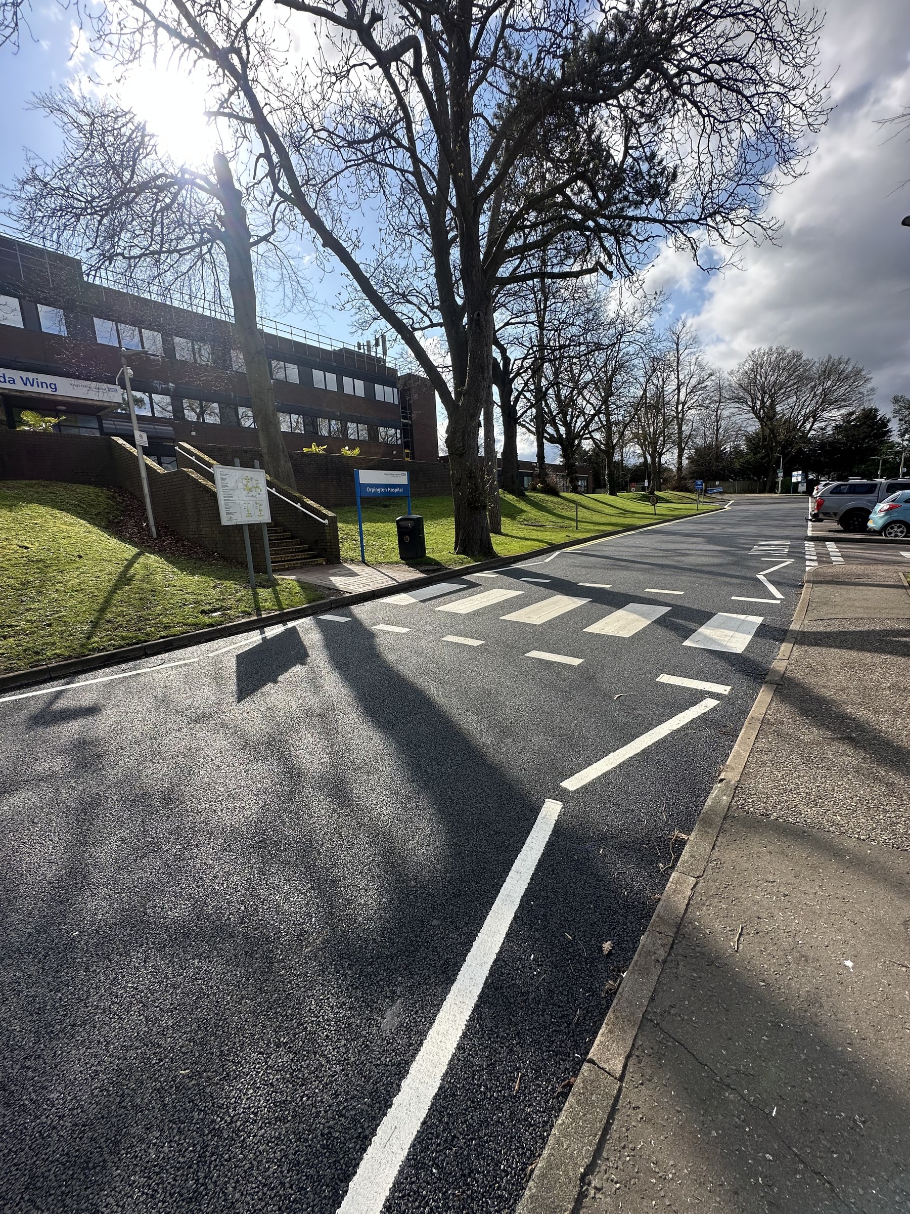 Freshly lined zebra crossing and new asphalt road at Orpington Hospital